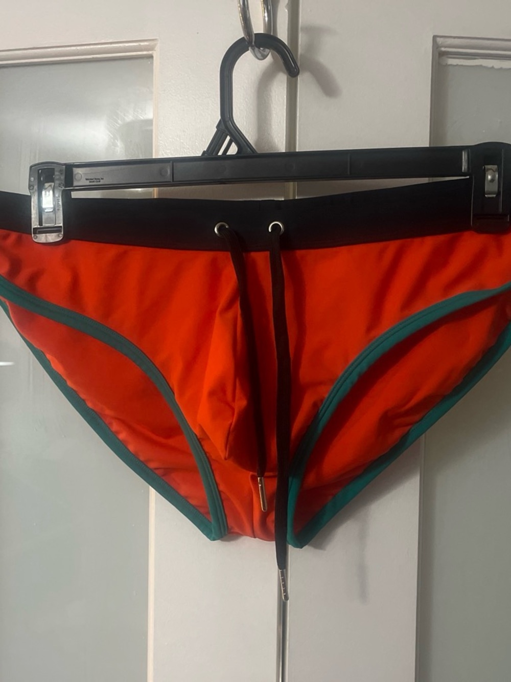 Men's Orange Swim Trunks with Teal Trim and Black Waistband
